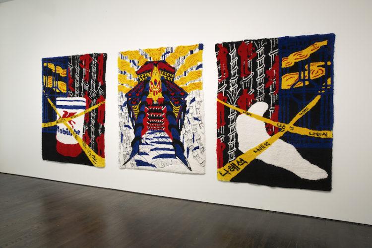 The large triptych Gumiho Reaper (RIP Yu Gwan Sun + Na Hye Sok), 2017. Scenes depicting an oil barrel, a body bag, police tape and a large fox-like mechanical monster.